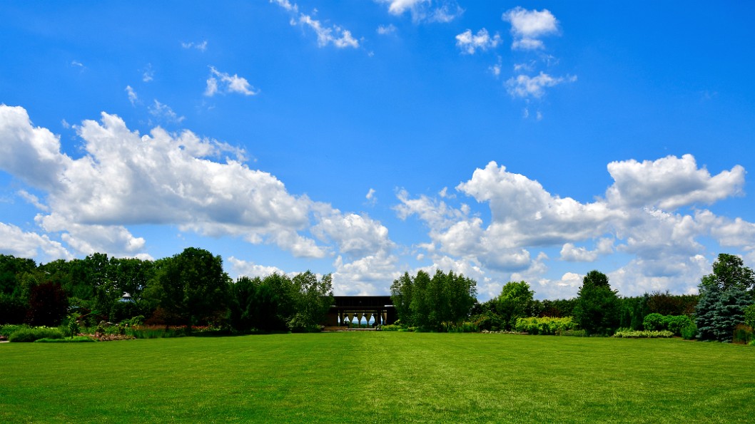 Blue Skies and Clouds Over the Lawn